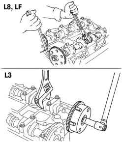 Ослабление болтов крепления звездочек распредвалов